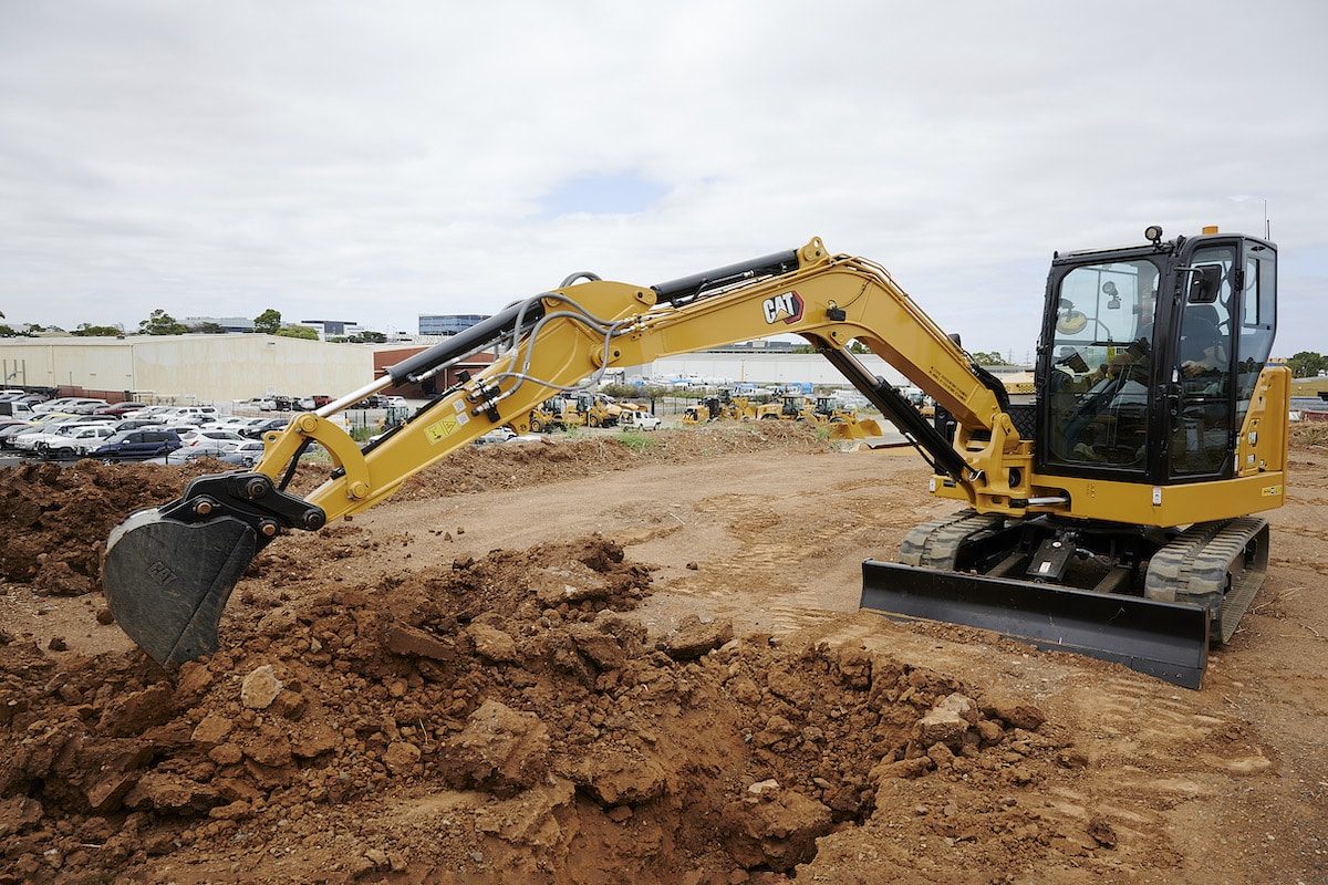 Mini excavator trenching and excavation